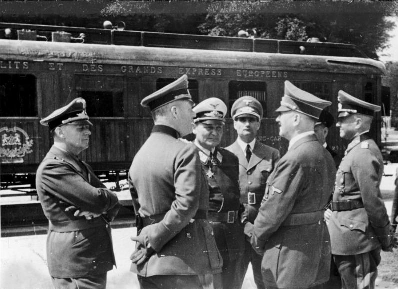 Adolf Hitler and his staff in front of the armistice wagon in Compiegne. Hitler had ordered that the same railway coach  from the 1918 armistice would be used for the 1940 armisitce with France